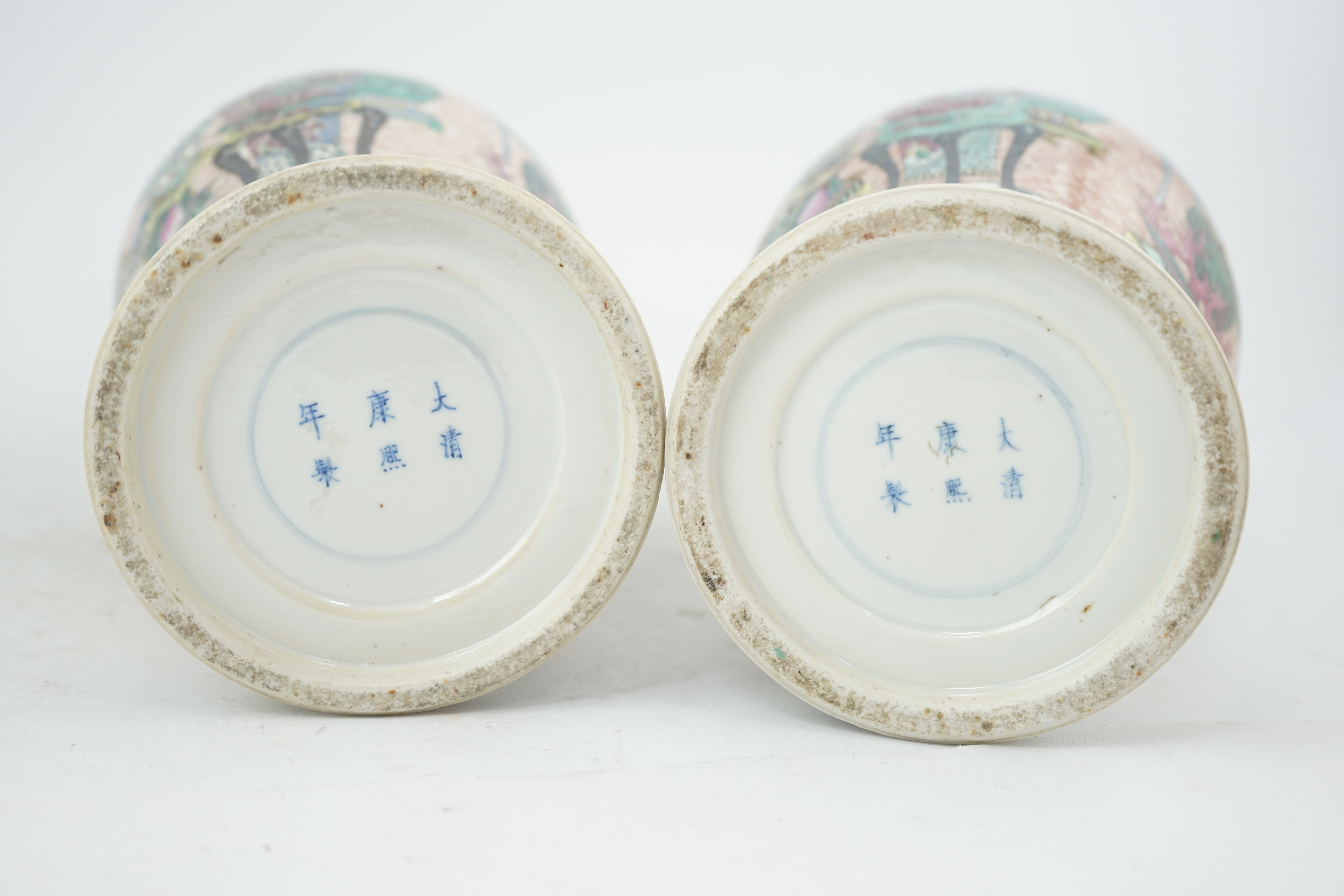 A near pair of Chinese famille rose ‘Hundred Antiques’ baluster vases, Kangxi mark, early 20th century